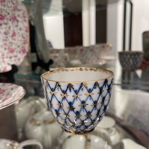 SOLD

Elegant Blue and Gold Patterned Mug